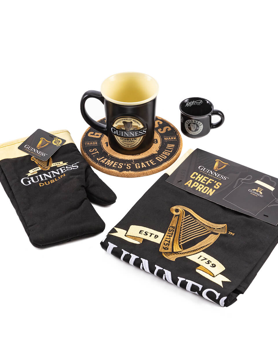 Guinness Storehouse Kitchen gift set with oven gloves, kitchen apron, 2 mugs and hot plate.