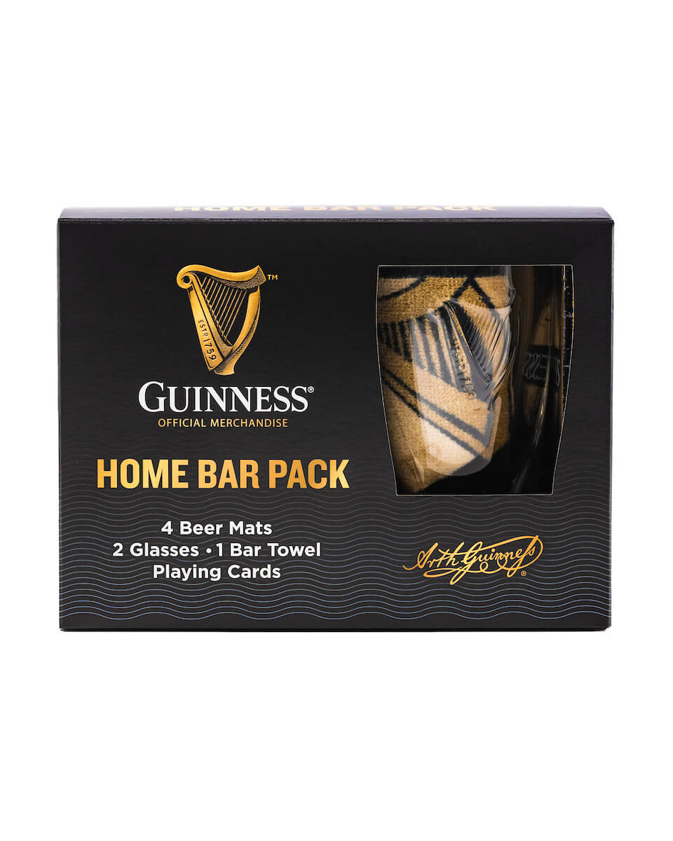 Guinness official merchandise home bar pack with 4 beer mats, 2 glasses, 1 bar towel and 1 playing cards deck.