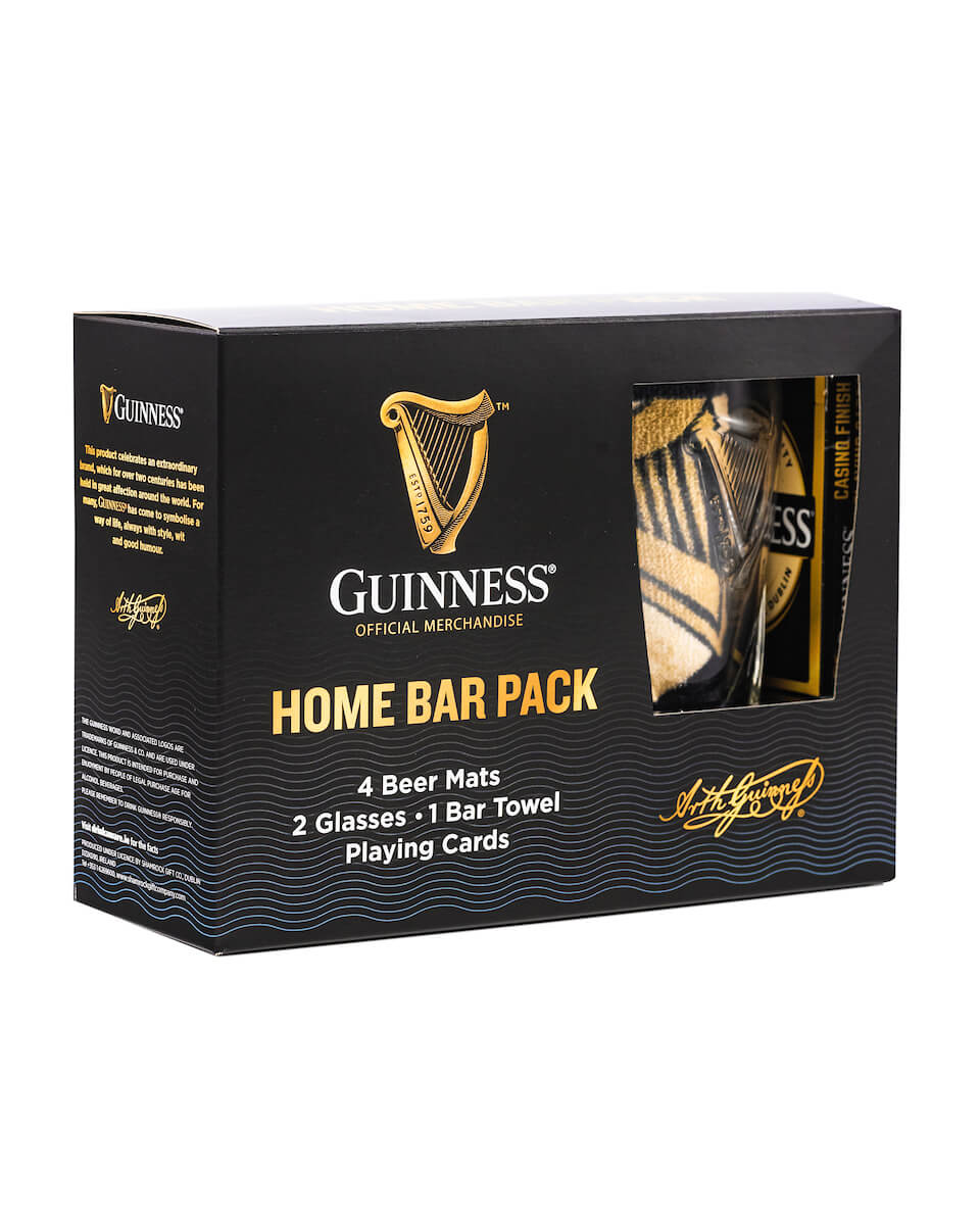 Guinness official merchandise home bar pack with 4 beer mats, 2 glasses, 1 bar towel and 1 playing cards deck.